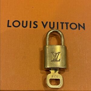 Louis Vuitton Gold Lock and Key Set👝